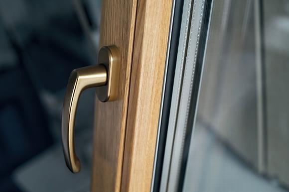 window with lighter wood foil finish